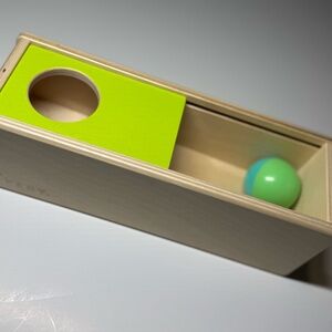Wooden Learning Toy with Green and Blue Elements